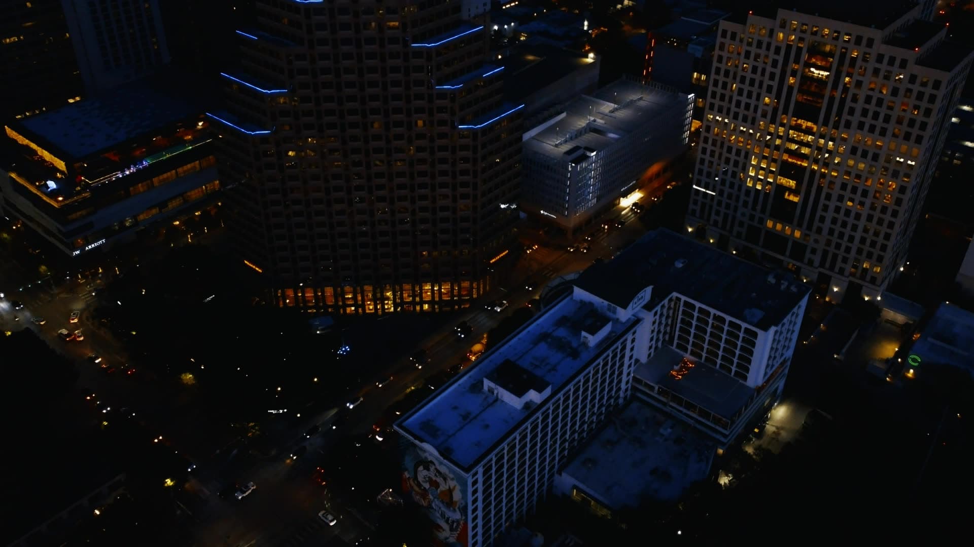 Aerial view of city buildings at dusk